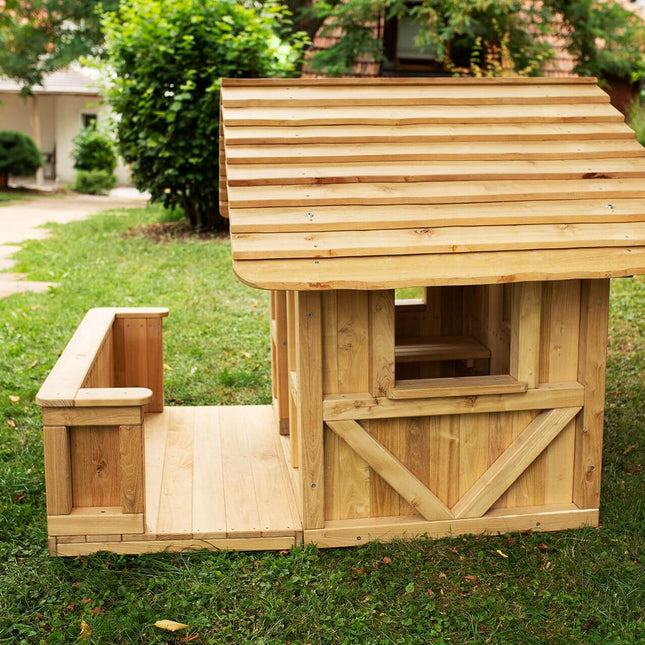 Spielhaus Robinchen – mit Terrasse
im Garten seitliche Ansicht