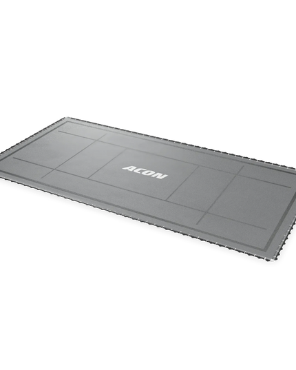 Schräg dargestellte ACON X Freestyle Trampolinmatte mit grauer Sprungfläche, schwarzen Markierungen und ACON Logo.