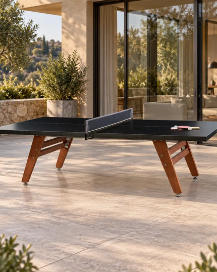RS Barcelona RS Stationary Tischtennisplatte auf einer Terrasse vor einem modernen Wohnhaus